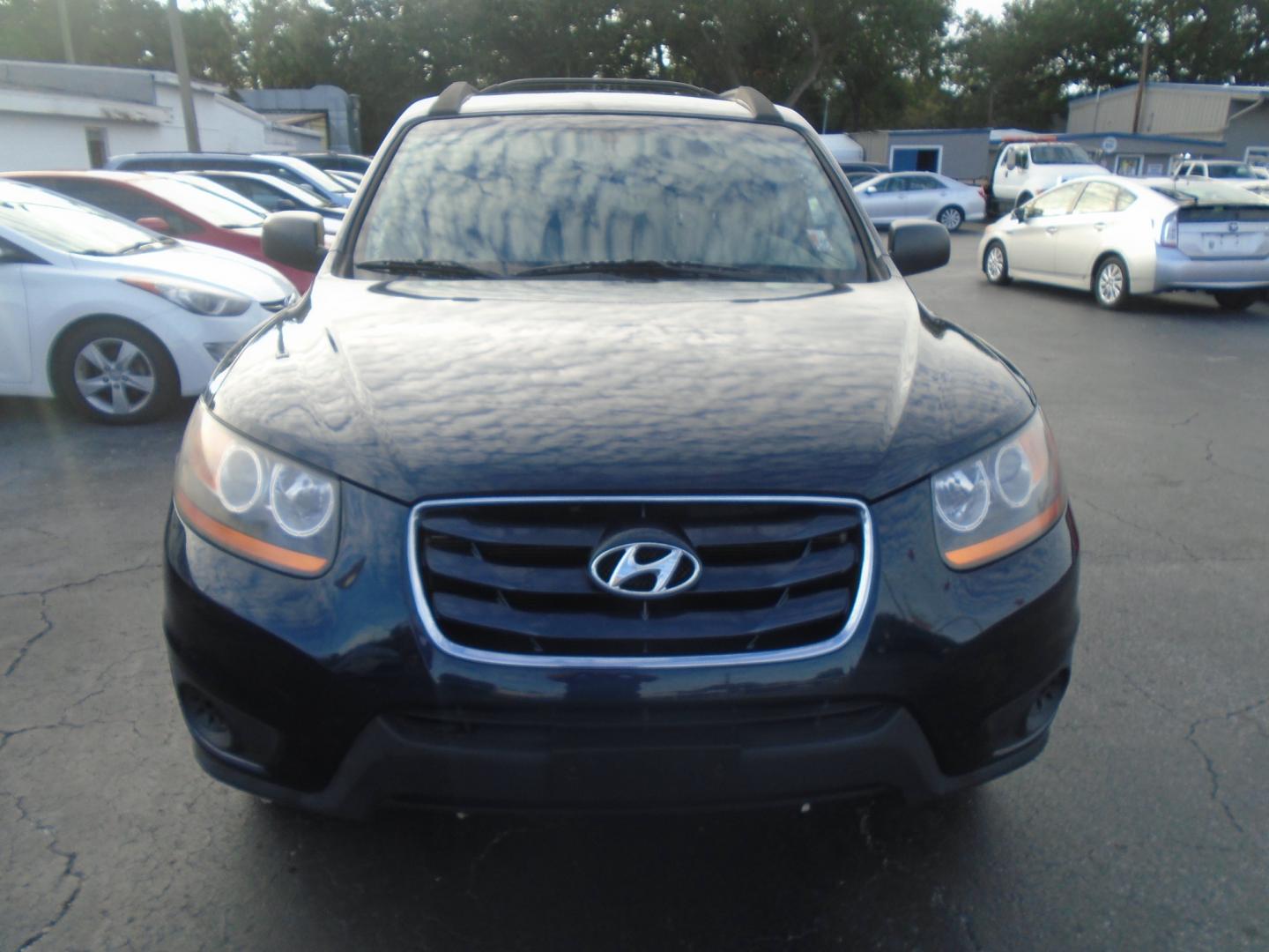 2011 Blue Hyundai Santa Fe GL 2.4 FWD (5XYZG3AB9BG) with an 4-Cyl, 2.4 Liter engine, Automatic, 6-Spd w/Overdrive and Shiftronic transmission, located at 6112 N Florida Avenue, Tampa, FL, 33604, (888) 521-5131, 27.954929, -82.459534 - Photo#1